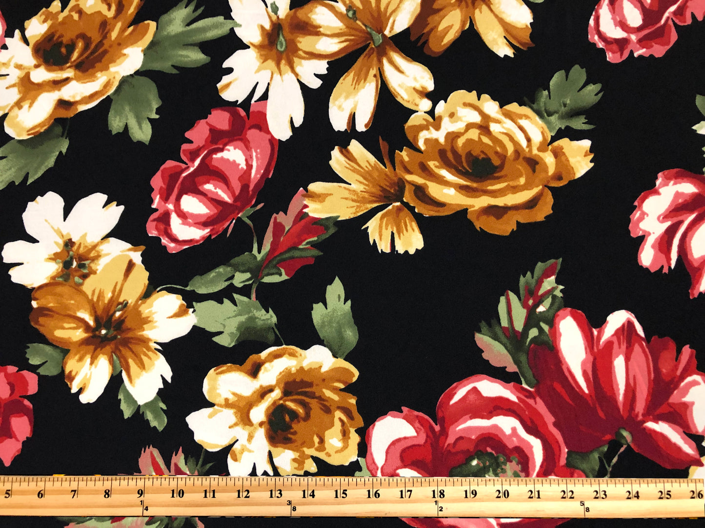 Techno Crepe Knit Fabric – Black with Marigold & Ivory Blooms, Red Rose Florals, Green Leaves – 4-Way Stretch, 56" Wide, 240 GSM – Sold by the Yard (TCRP046)
