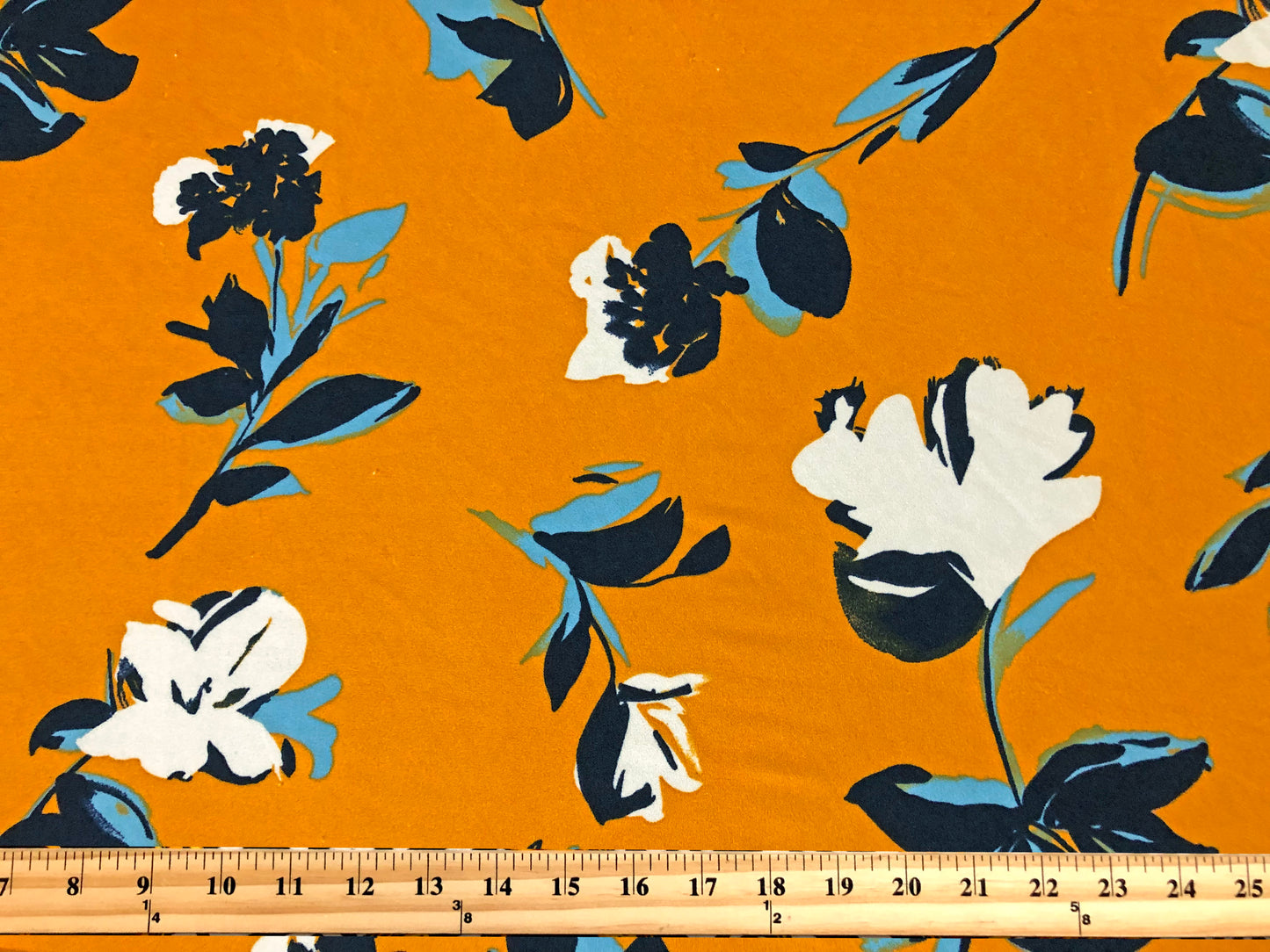 Crepe Knit Fabric – Mustard Ochre with Ivory Blossoms & Navy/Teal Leaves – 4-Way Stretch, 56" Wide, 240 GSM, Silky Drape – Sold by the Yard (TCRP035)