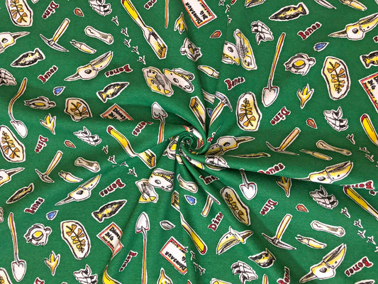 Dino Dig Cotton Print – 100% Cotton | Non-Stretch, 50″ Wide, Green Fossils & Tools – Sold by the Yard (CTJPR03)
