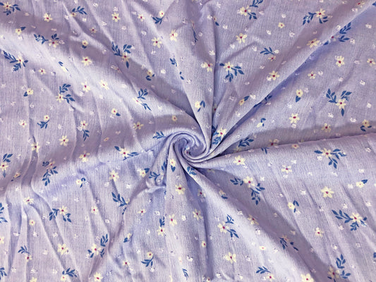 Lavender Swiss Dot Rayon Gauze with White Ditsy Florals & Blue Leaves — 100% Rayon, 52″ Wide — Fabric by the Yard (RGZPR010)