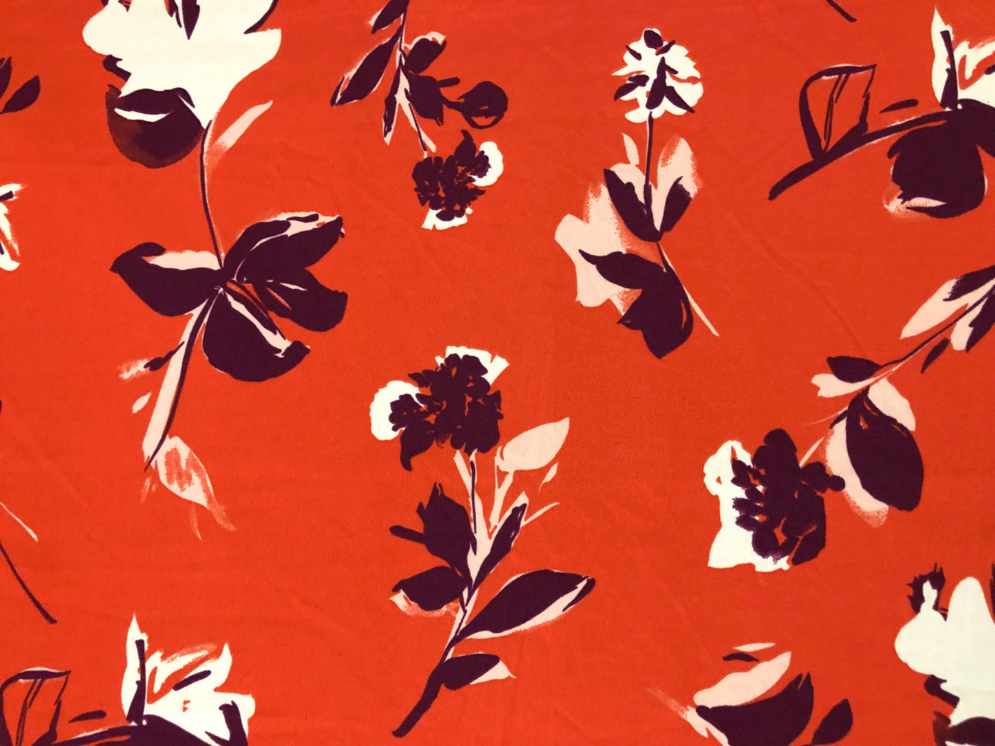 Techno Crepe Knit Fabric – Intense Orange with Deep Plum & Ivory Florals – 4-Way Stretch, 56" Wide, 240 GSM, Silky Drape – Sold by the Yard (TCRP034)