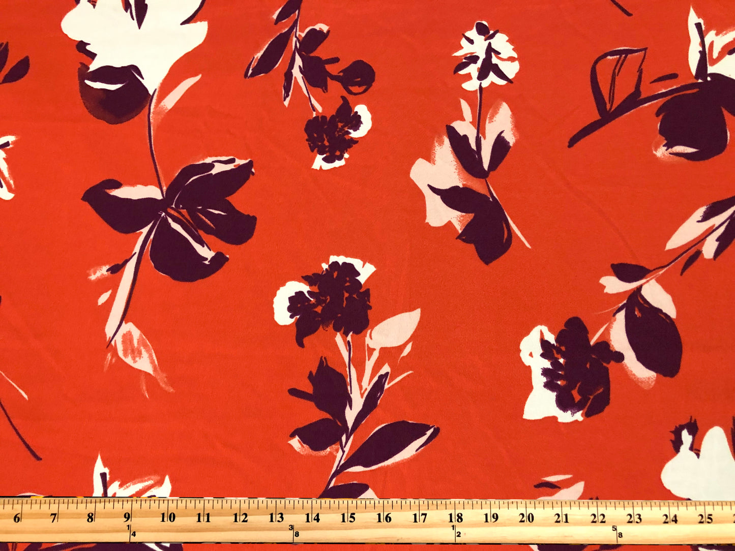Techno Crepe Knit Fabric – Intense Orange with Deep Plum & Ivory Florals – 4-Way Stretch, 56" Wide, 240 GSM, Silky Drape – Sold by the Yard (TCRP034)