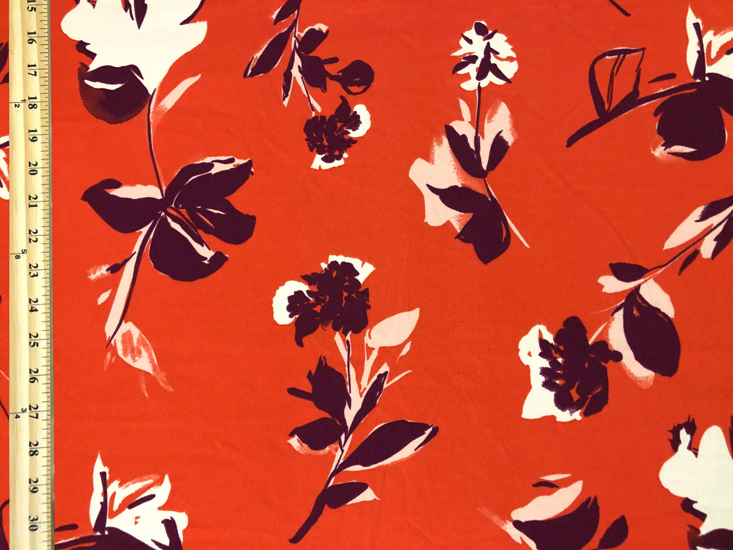 Techno Crepe Knit Fabric – Intense Orange with Deep Plum & Ivory Florals – 4-Way Stretch, 56" Wide, 240 GSM, Silky Drape – Sold by the Yard (TCRP034)