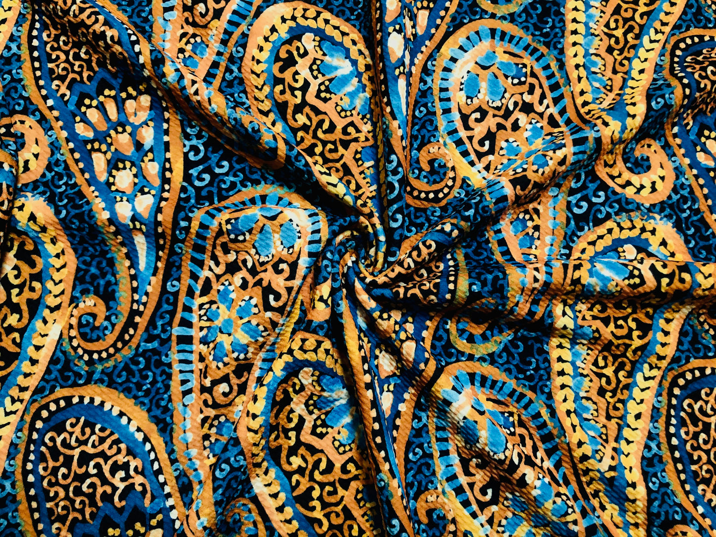 Bullet Knit Fabric – Vibrant Mustard & Turquoise Paisley Motif Print on Deep Navy, 56″ Wide, Sold by the Yard (BPR236)