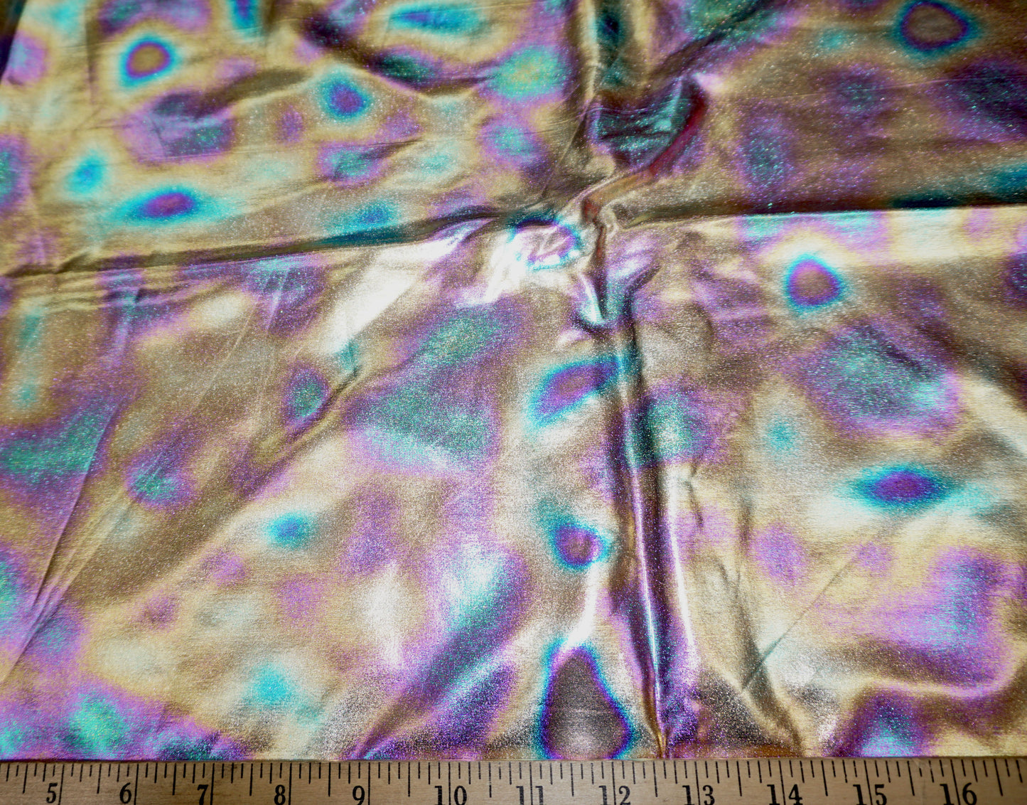 Oil-Slick PU/PVC Faux Leather — Hologram Gold • Soft Knit Back, 2-Way Stretch | 58″ Wide | 95% Polyester / 5% Spandex | By the Yard (PVCVH01)