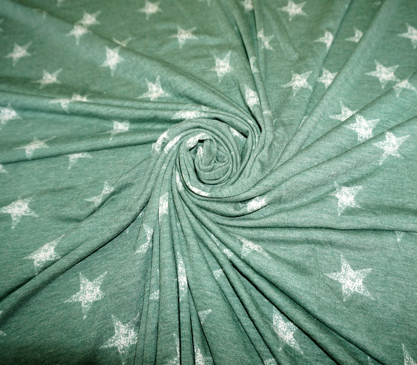 Star Print Jersey Knit Fabric – Green with White Stars – 65% Polyester / 32% Rayon / 3% Spandex – 58″ Wide – Sold by the Yard (PRSXPR05)