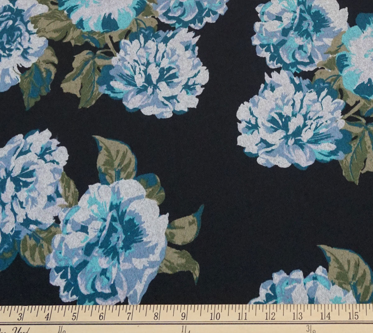 Comfy Black & Teal Floral Hacci Sweater Knit – 56″ Wide, 95% Polyester 5% Spandex – Sold by the Yard (HSPR003)
