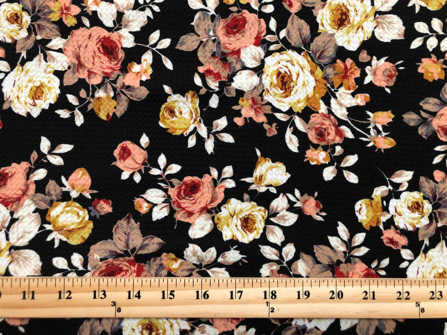 Bullet Knit Fabric – Rose Floral Stretch Print in Mauve & Yellow on Black, 56″ Wide, Sold by the Yard (BPR255)