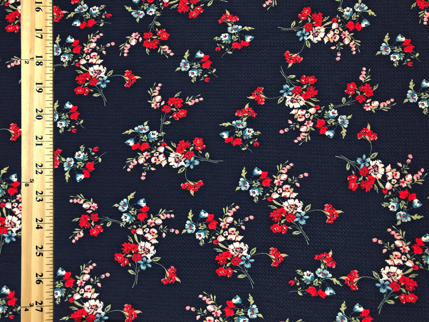 Bullet Knit Fabric – Ditsy Floral Stretch Print in Red, Pink & Blue on Navy, 56″ Wide, Sold by the Yard (BPR271)