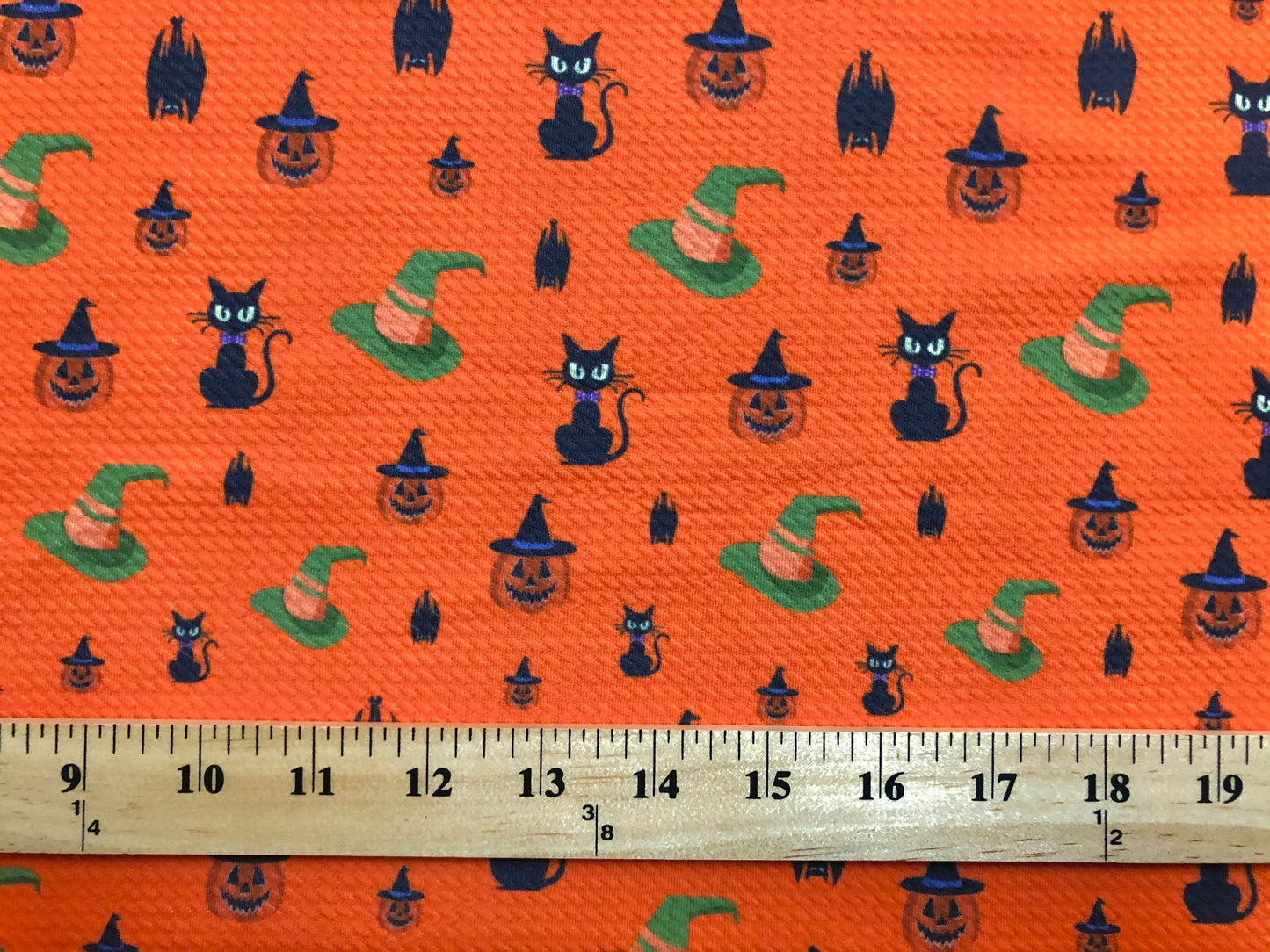 Bullet Knit Halloween Fabric – Black Cats, Witch Hats & Jack‑O’‑Lantern Print on Intense Orange, 56″ Wide, Sold by the Yard (BPR183)