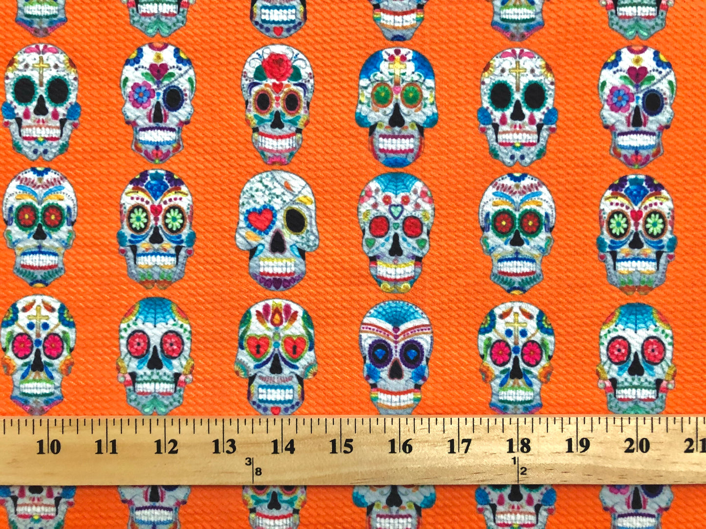 Premium Bullet Knit Fabric –Sugar Skull Day of the Dead Colorful on Vibrant Orange Print, 56″ Wide, Sold by the Yard (BPR186)