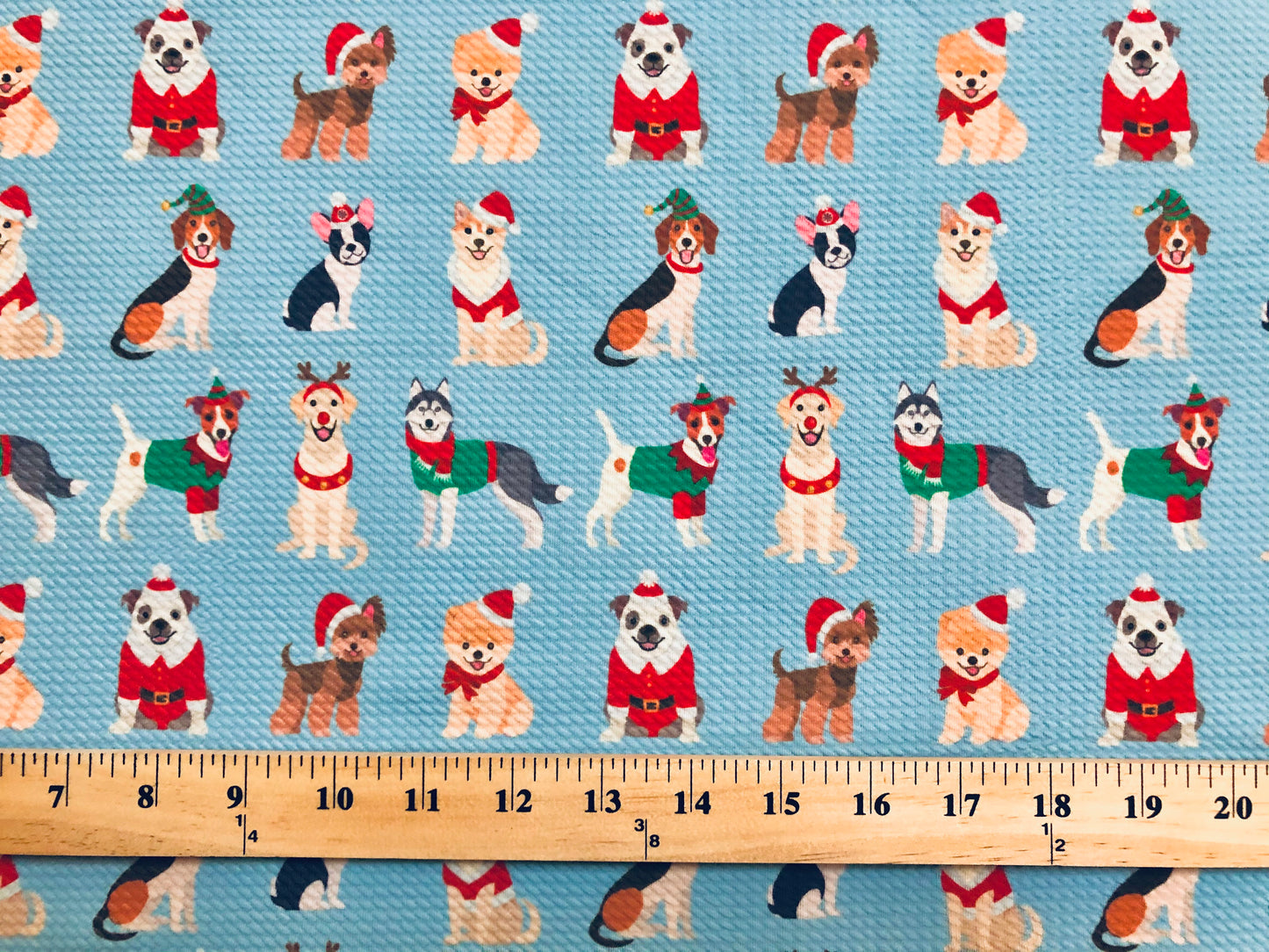 Premium Bullet Knit Fabric – Festive Pups in Santa, Reindeer & Elf Costumes on Light Blue, 56″ Wide, Sold by the Yard (BPR194)