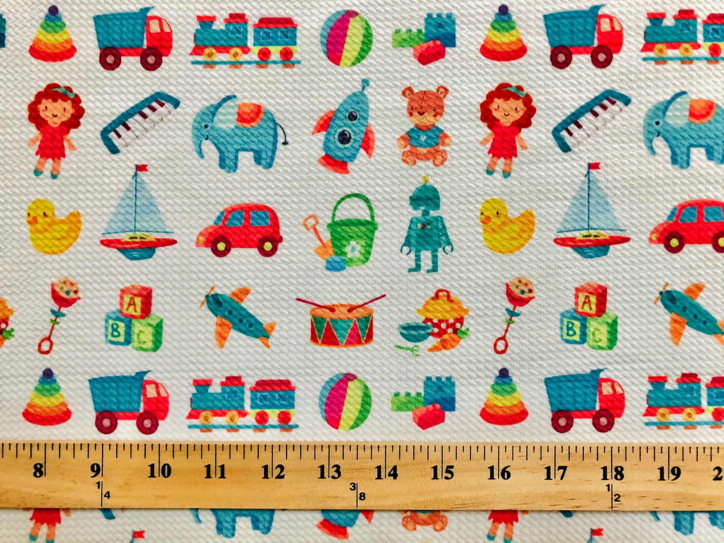 Bullet Knit Stretch Fabric – Colorful ABC Blocks, Trains & Toys Print on White, 56″ Wide, Sold by the Yard (BPR207)