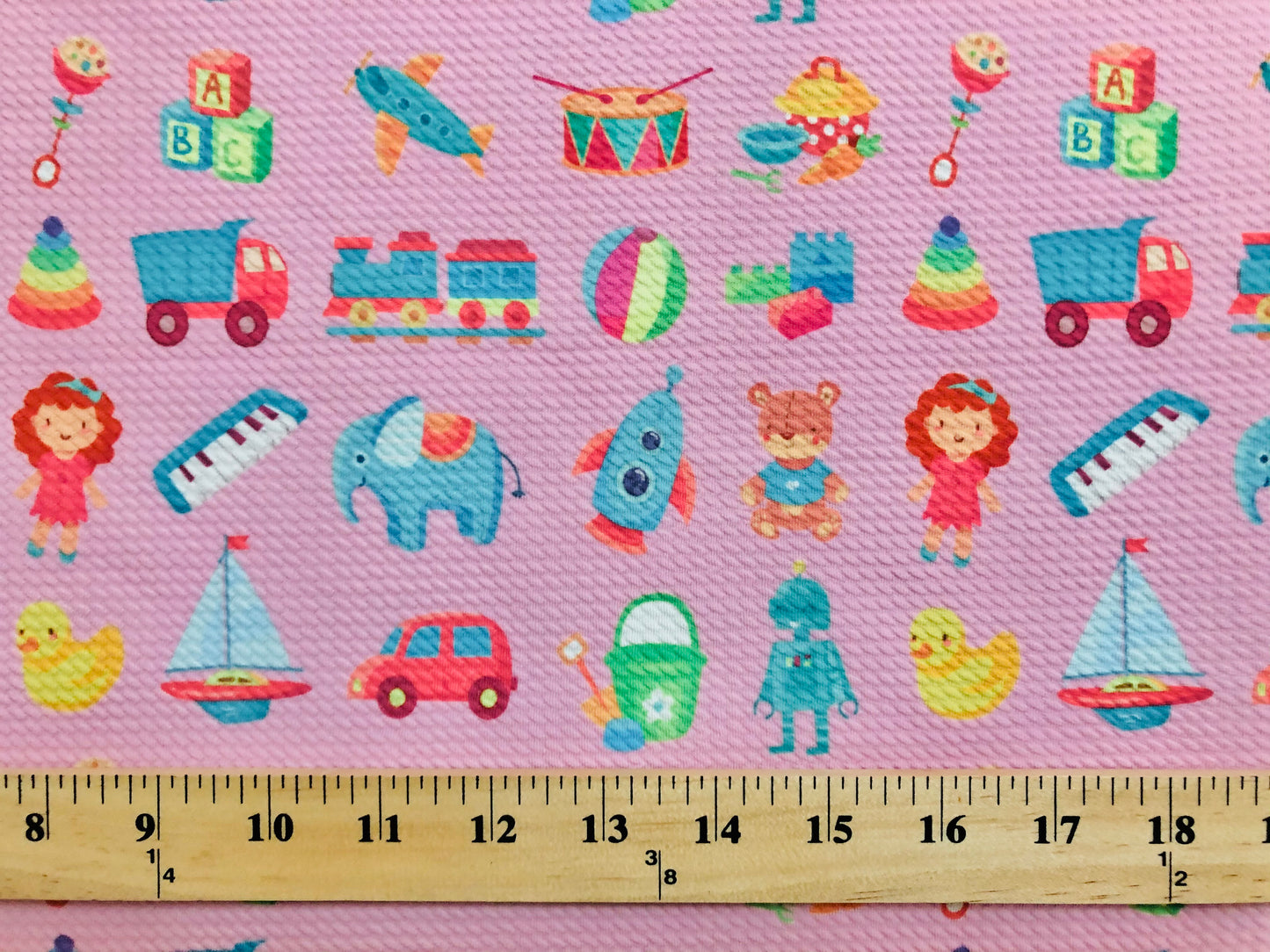 Bullet Knit Stretch Fabric – Colorful ABC Blocks, Trains & Toys Print on Pink, 56″ Wide, Sold by the Yard (BPR209)