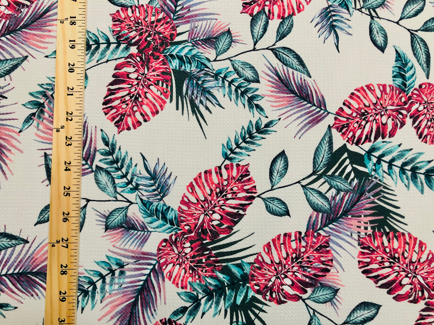 Bullet Knit Fabric – Vibrant Tropical Palm Leaf Print in Red & Pink on Ivory, 56″ Wide, Sold by the Yard (BPR2300)