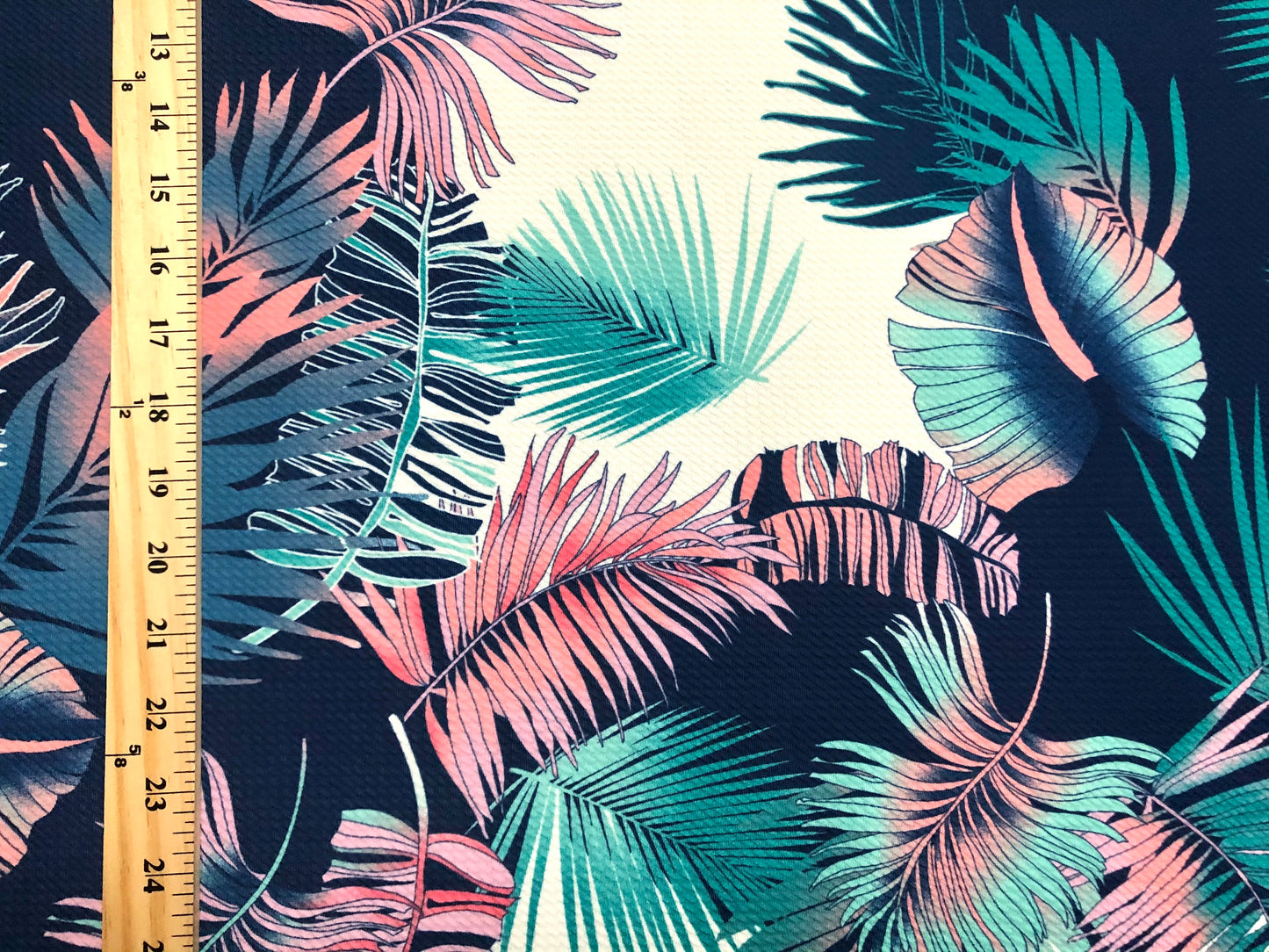 Bullet Knit Fabric – Vibrant Tropical Palm Leaf Print in Lavender, Green & mint on Navy & White, 56″ Wide, Sold by the Yard (BPR230)