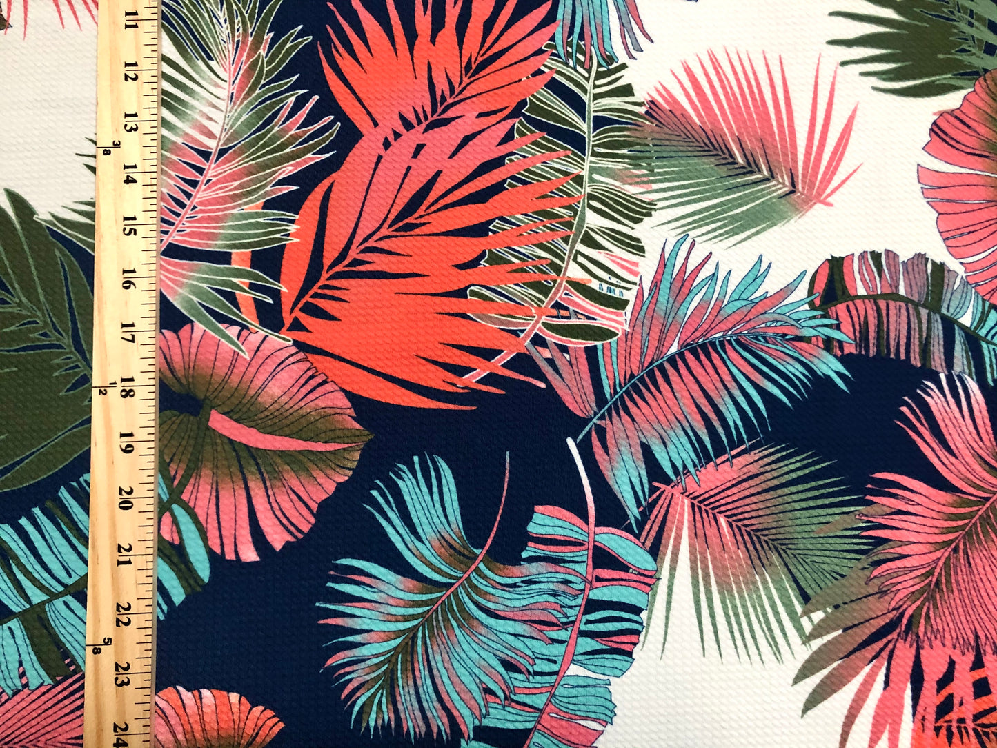 Bullet Knit Fabric – Vibrant Tropical Palm Leaf Print in Coral, Mint & Olive on Navy & White, 56″ Wide, Sold by the Yard (BPR229)