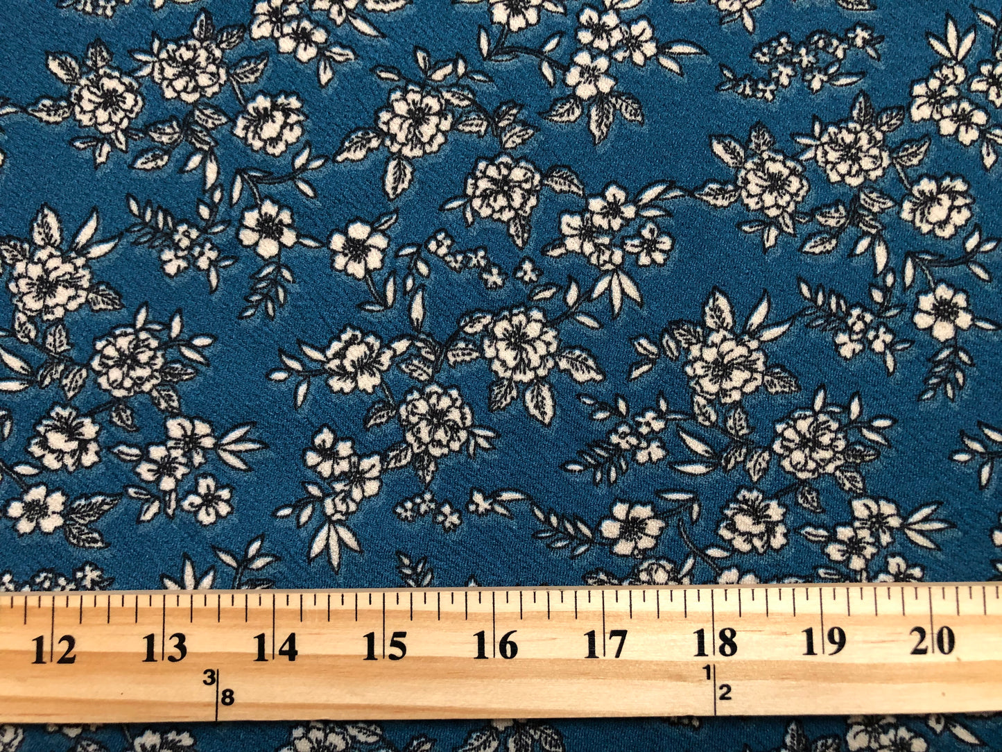 Liverpool Knit Fabric – Teal & Ivory Ditsy Floral – 4-Way Stretch, 56” Wide, 200 GSM – Sold by the Yard (LVPR246)
