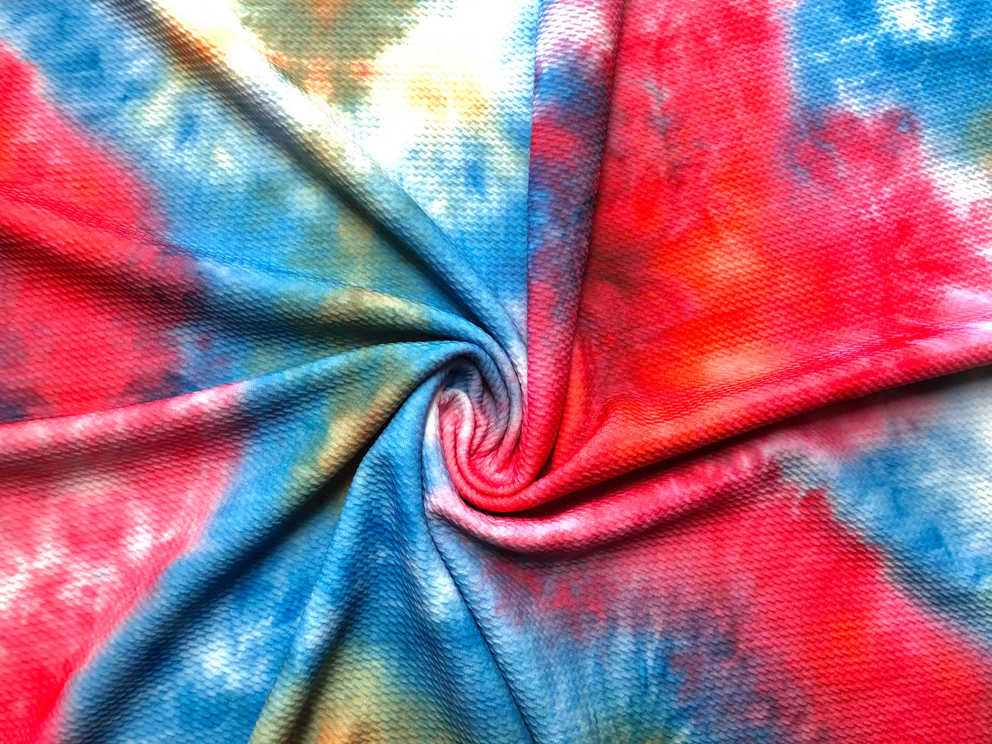 Bullet Knit Fabric – Blue, Green & Gold Tie‑Dye Stretch Print, 56″ Wide, Sold by the Yard (BTDPR04)