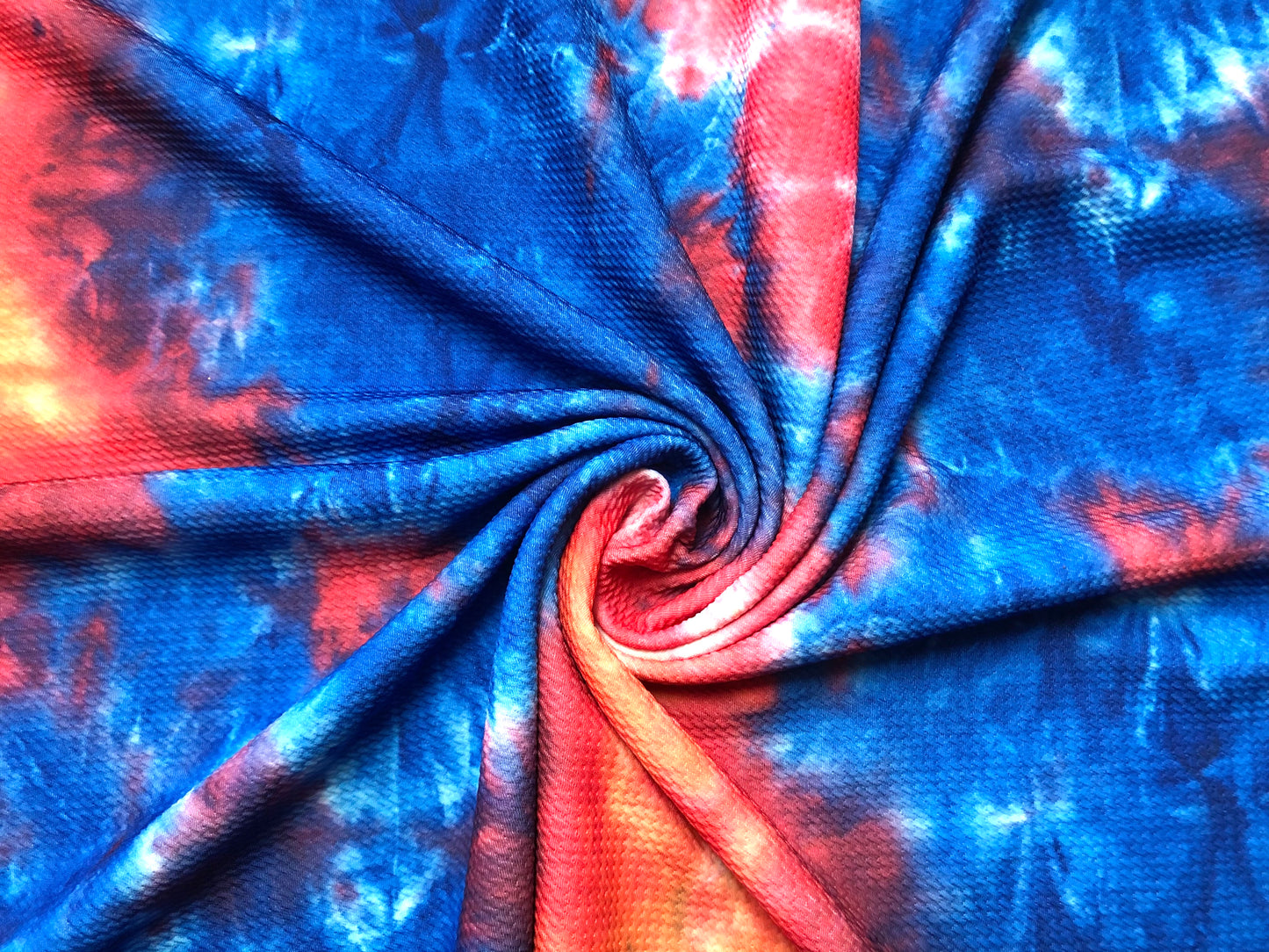 Royal Blue/Red/Coral Kaleidoscope Tie Dye Bullet Knit Fabric – Textured 4 Way Stretch, 58" Wide, 200 GSM – By the Yard (BTD06)