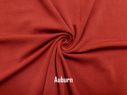 Auburn Solid Color Bullet Fabric