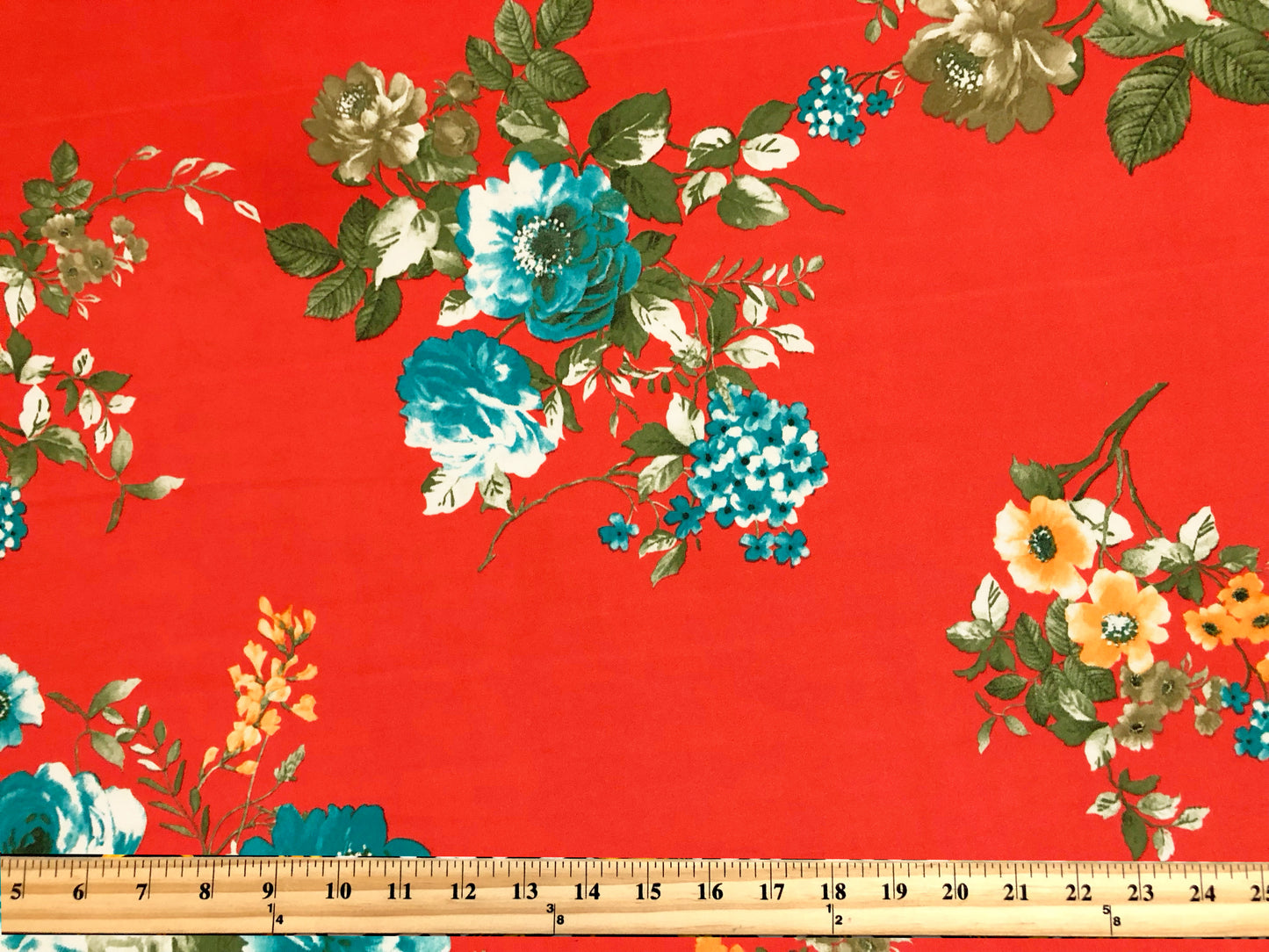 Scuba Techno Knit Fabric – Orange/Blue Floral Bouquet | 4-Way Stretch, 56″ Wide, 220 GSM – By the Yard (SCTPR026)
