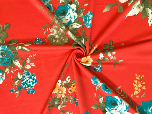 Scuba Techno Knit Fabric – Orange/Blue Floral Bouquet | 4-Way Stretch, 56″ Wide, 220 GSM – By the Yard (SCTPR026)