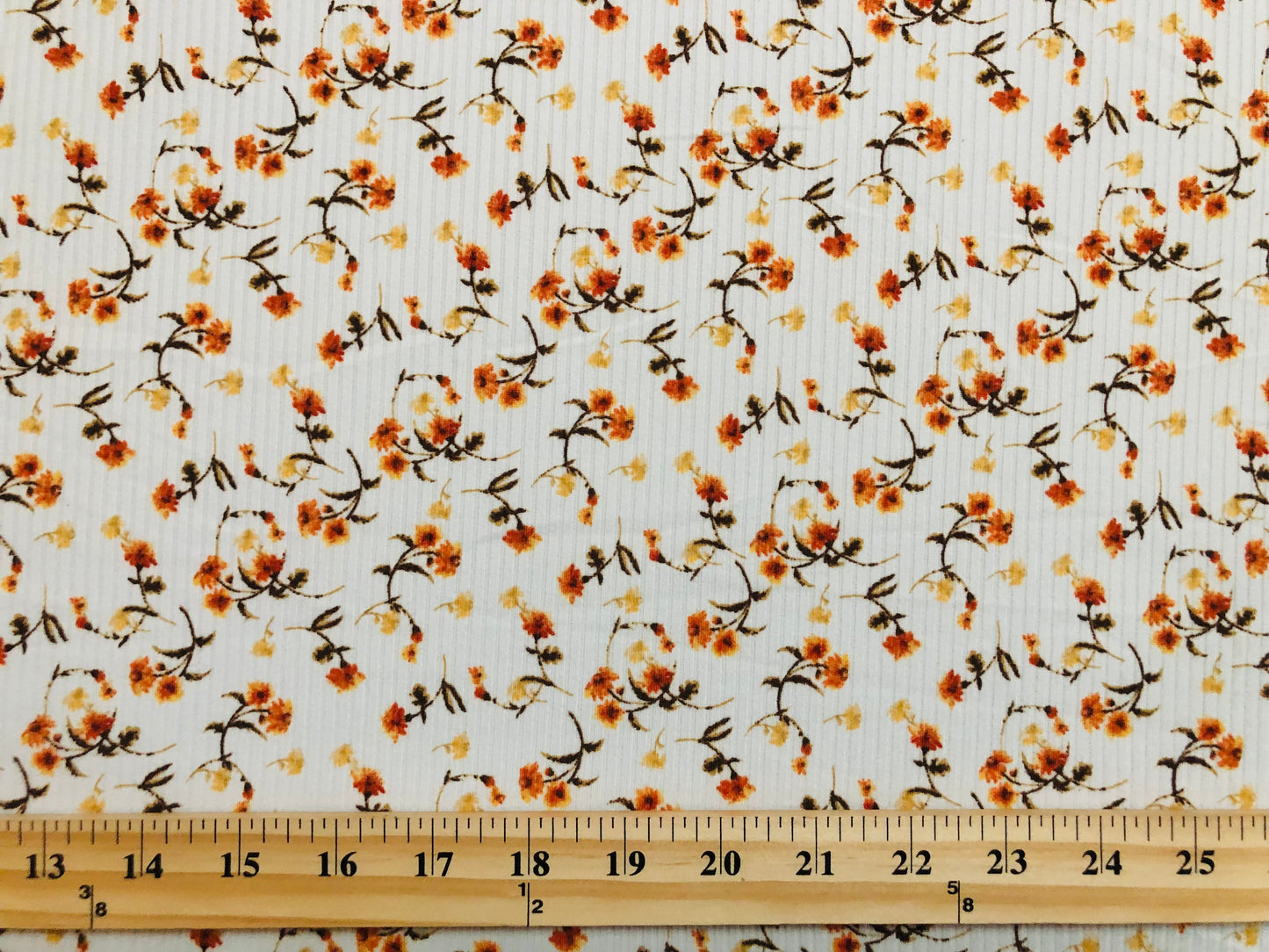 Ivory Orange Yellow 7/8" Flowers Poly Rayon Spandex Rib 2X2 Fabric