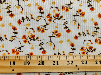 Ivory Orange Yellow 7/8" Flowers Poly Rayon Spandex Rib 2X2 Fabric