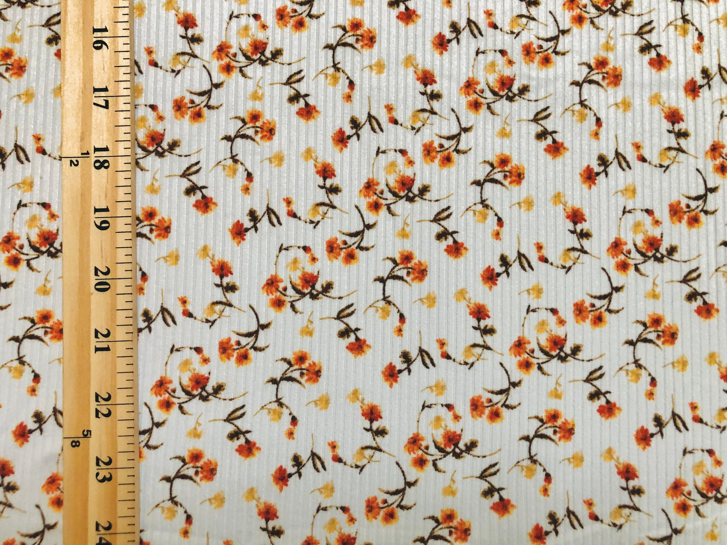 Ivory Orange Yellow 7/8" Flowers Poly Rayon Spandex Rib 2X2 Fabric