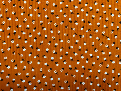 Pumpkin Ivory Black 1/4" Flowers Poly Rayon Spandex Rib 2X2 Fabric