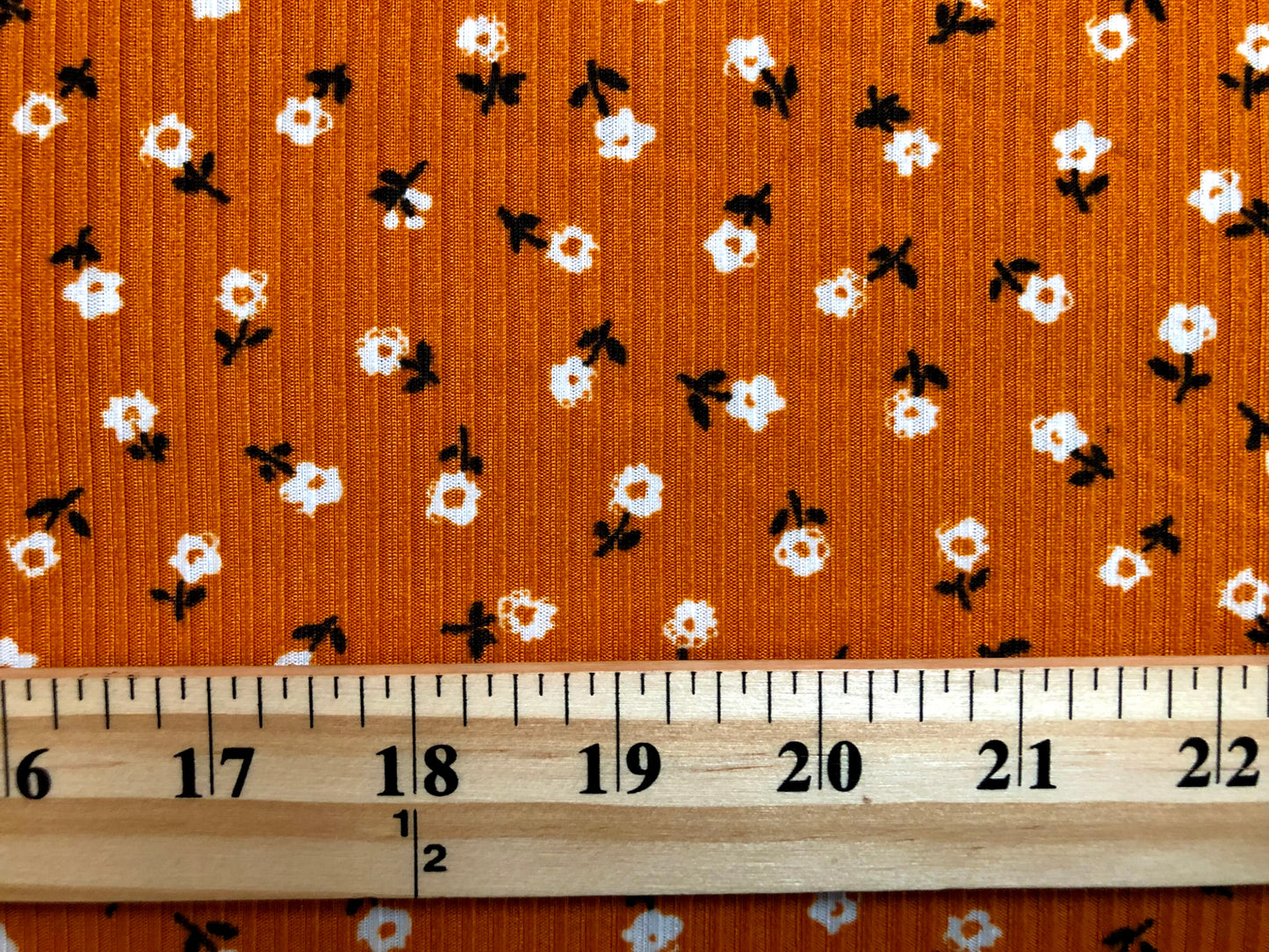 Pumpkin Ivory Black 1/4" Flowers Poly Rayon Spandex Rib 2X2 Fabric