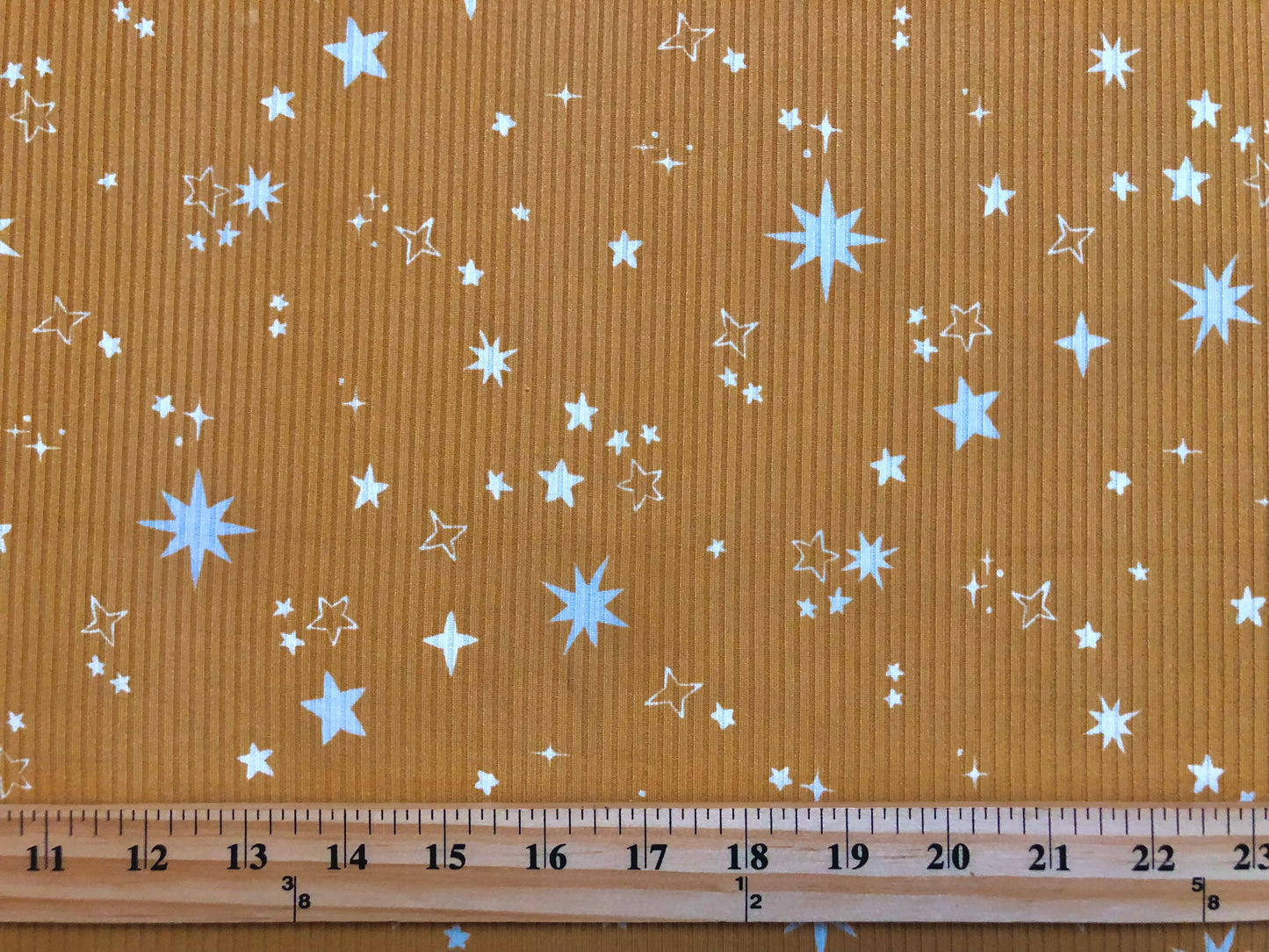 Mustard White Stars Poly Rayon Spandex Rib 2X2 Fabric