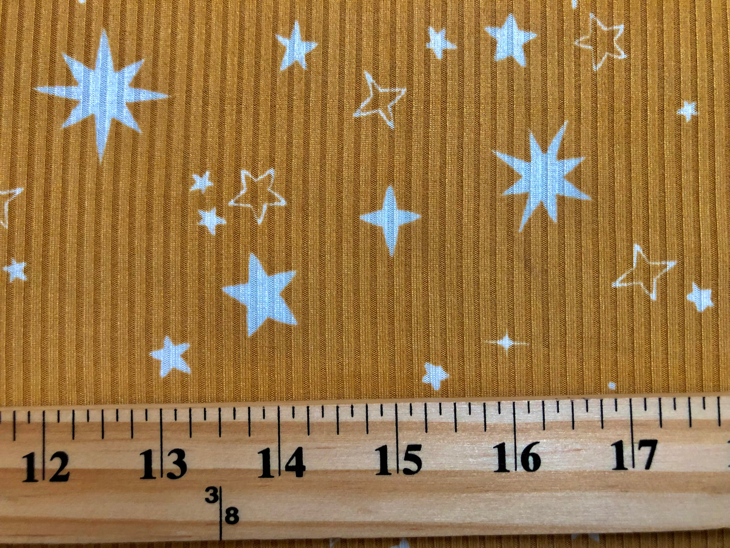 Mustard White Stars Poly Rayon Spandex Rib 2X2 Fabric