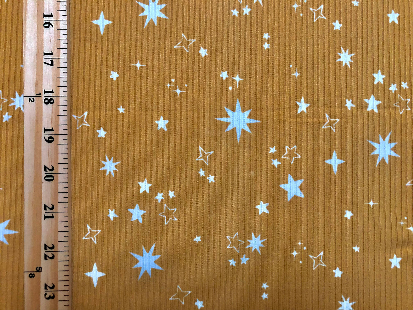 Mustard White Stars Poly Rayon Spandex Rib 2X2 Fabric