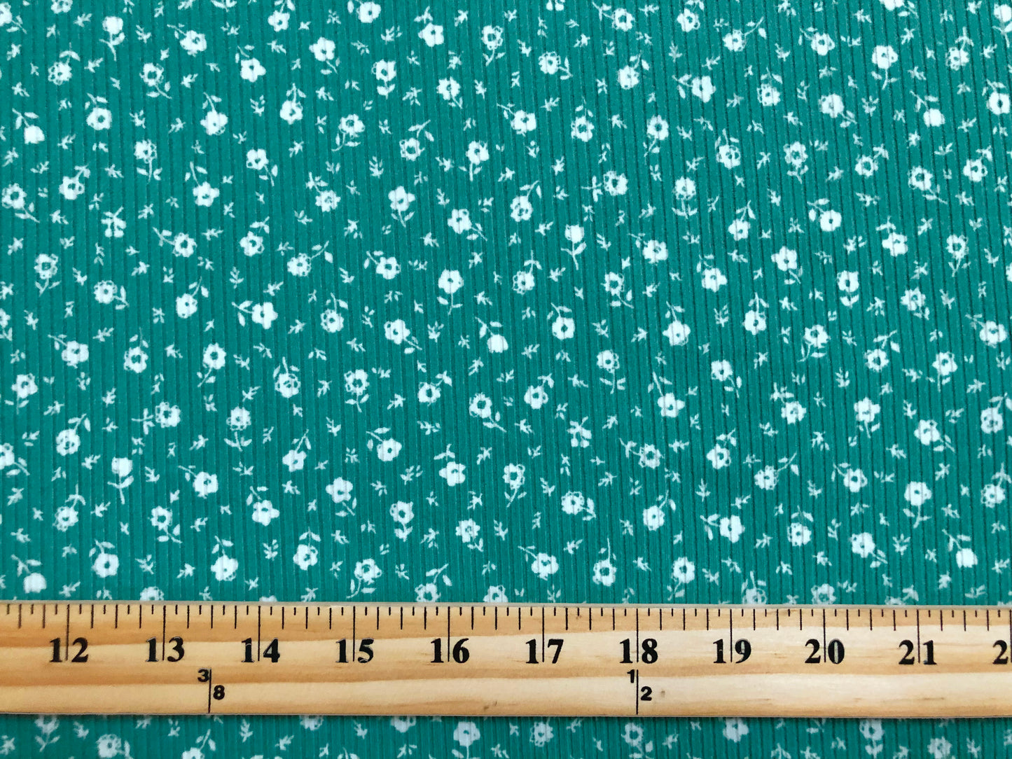 Green White 1/4" Buttercup Flowers Rayon Spandex Rib 2X1 Print Fabric