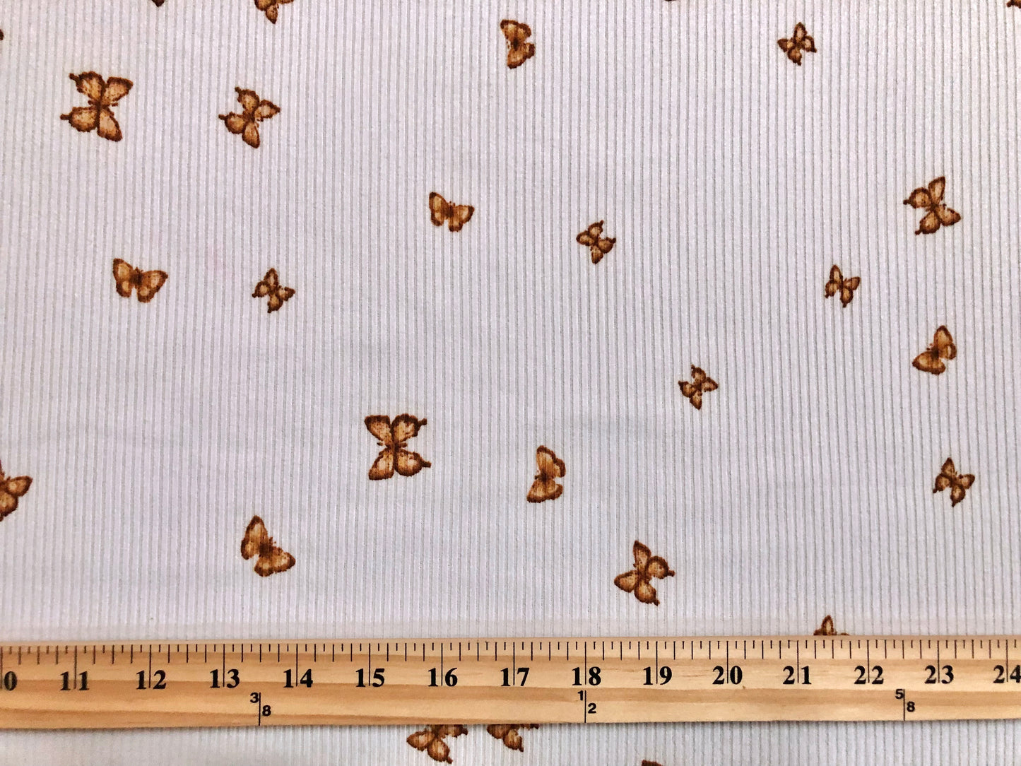 Ivory Brown 1" Butterflies Rayon Spandex Rib 2X2 Print Fabric