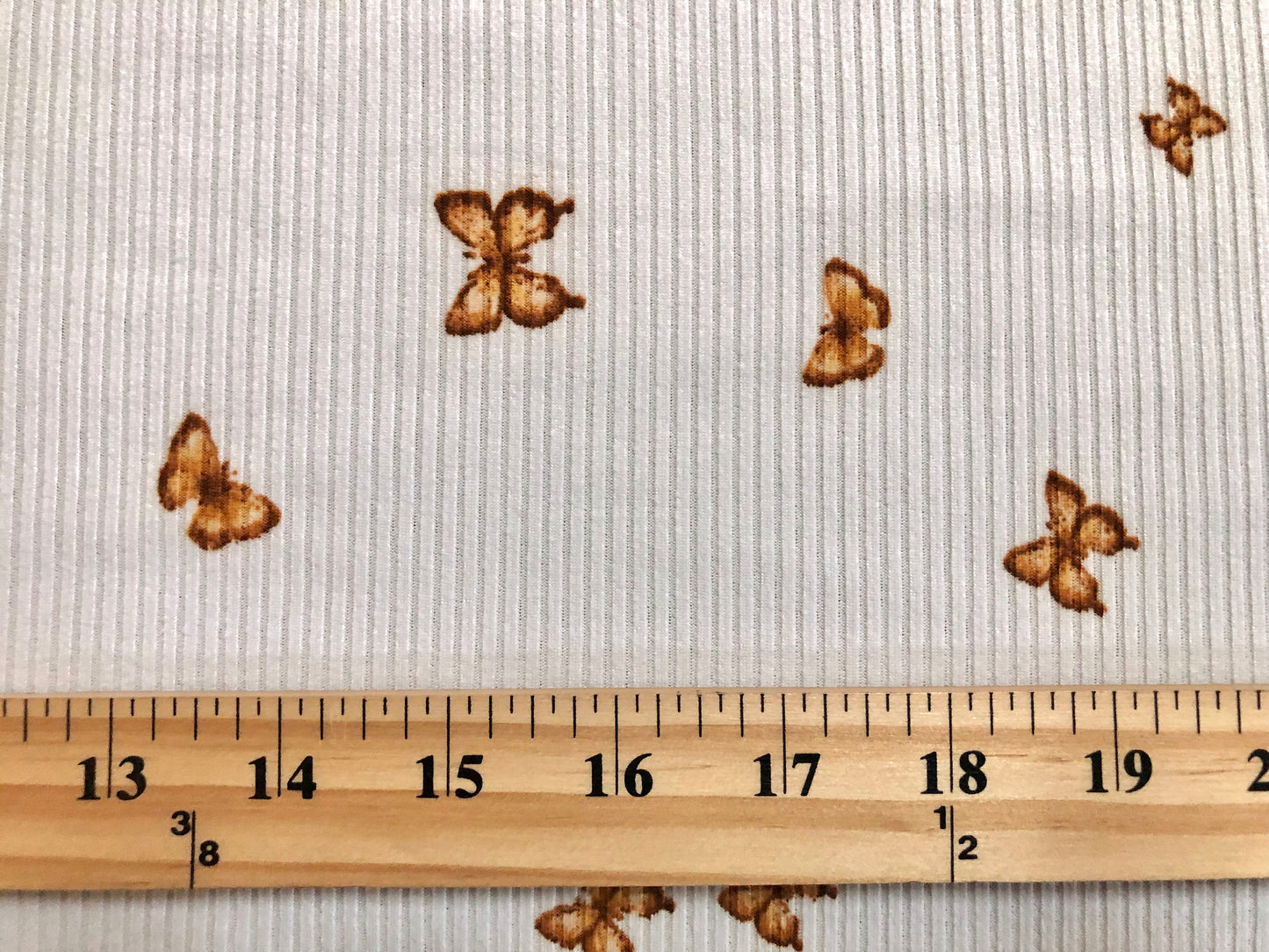 Ivory Brown 1" Butterflies Rayon Spandex Rib 2X2 Print Fabric