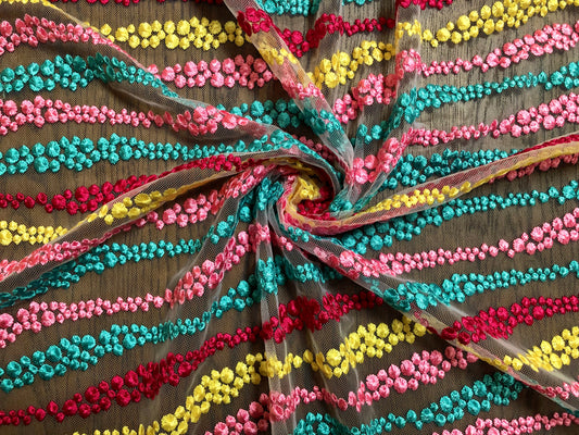 Pink Yellow Magenta Aqua Blue Spiral Bubbled Embroidered Design on Transparent Mesh Fabric