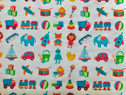 Bullet Knit Printed Fabric-Ivory Blue Toys-BPR207-Sold by the Yard-Bulk Available